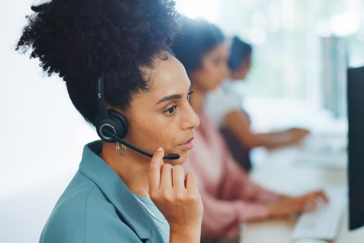 A woman works at call center in customer service